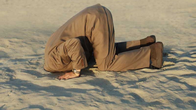 iStock-head-in-sand