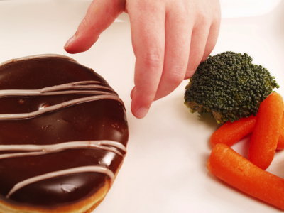 kid-reaching-for-donut-willpower-article
